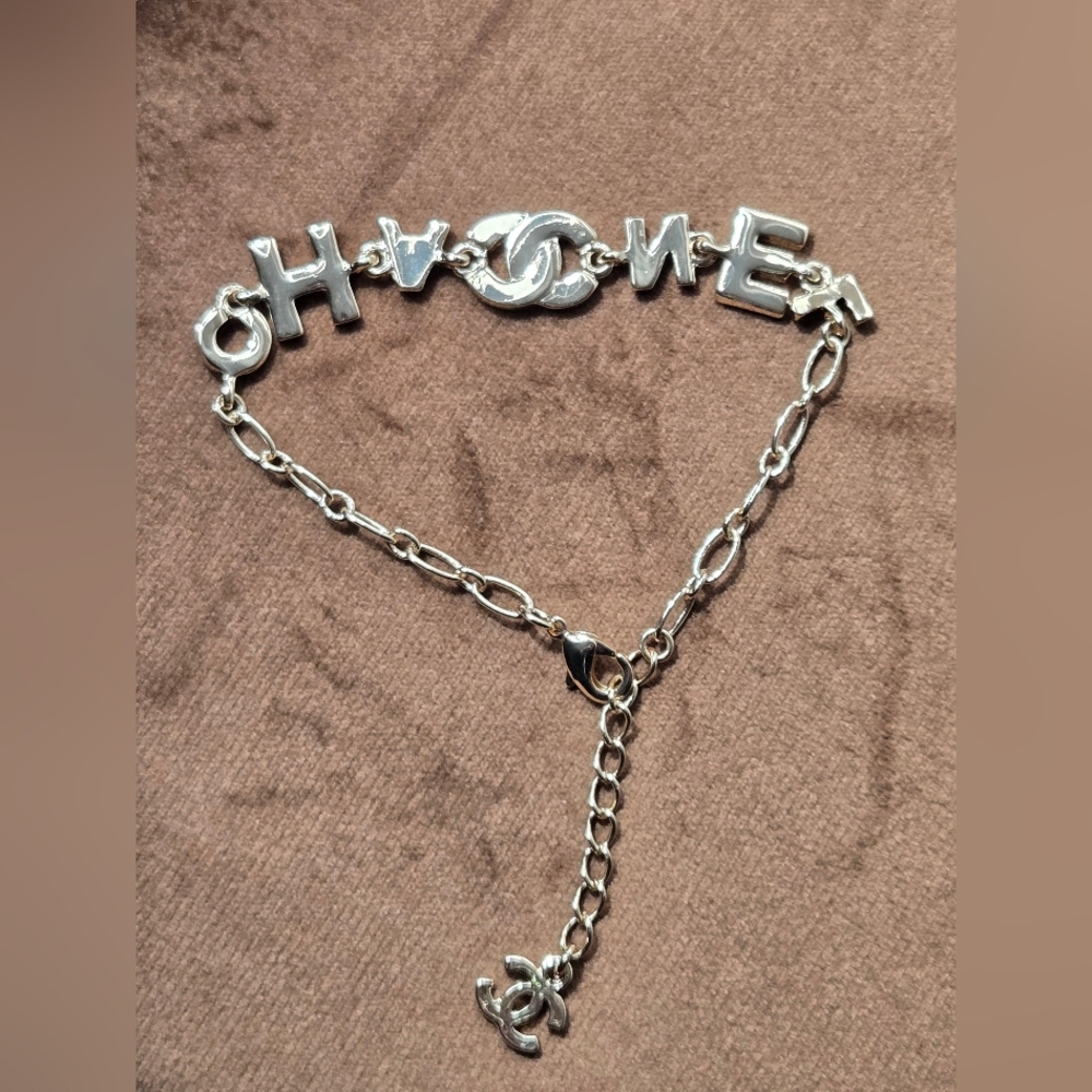 Gold Tone Logo Bracelet With Rocks - Picture 5 of 14